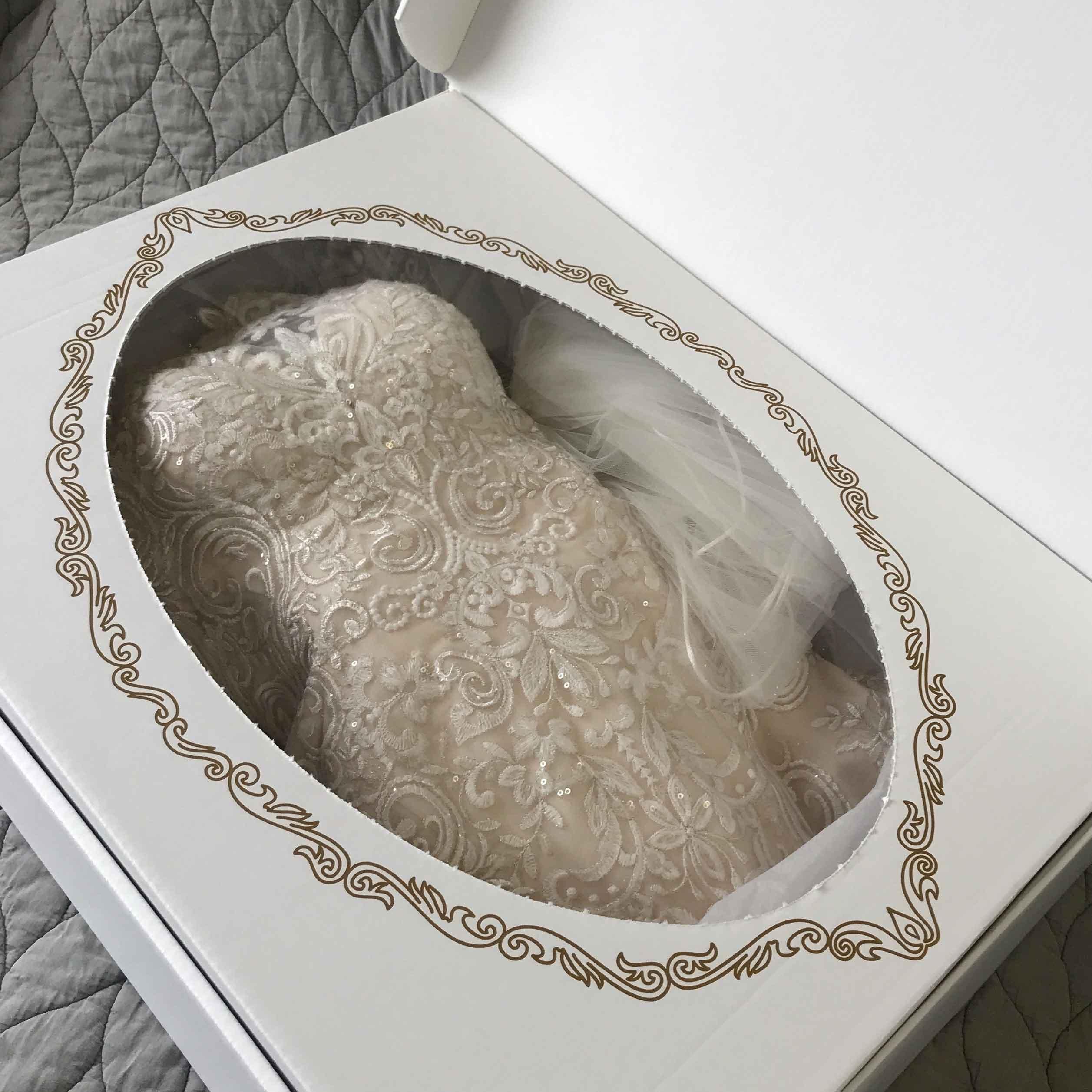 Elegant wedding gown cleaned by Sunny Dry Cleaners